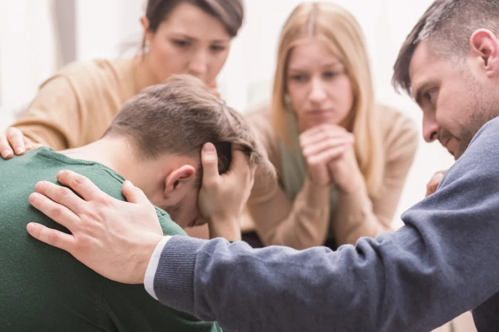 People participate in family therapy for addiction.