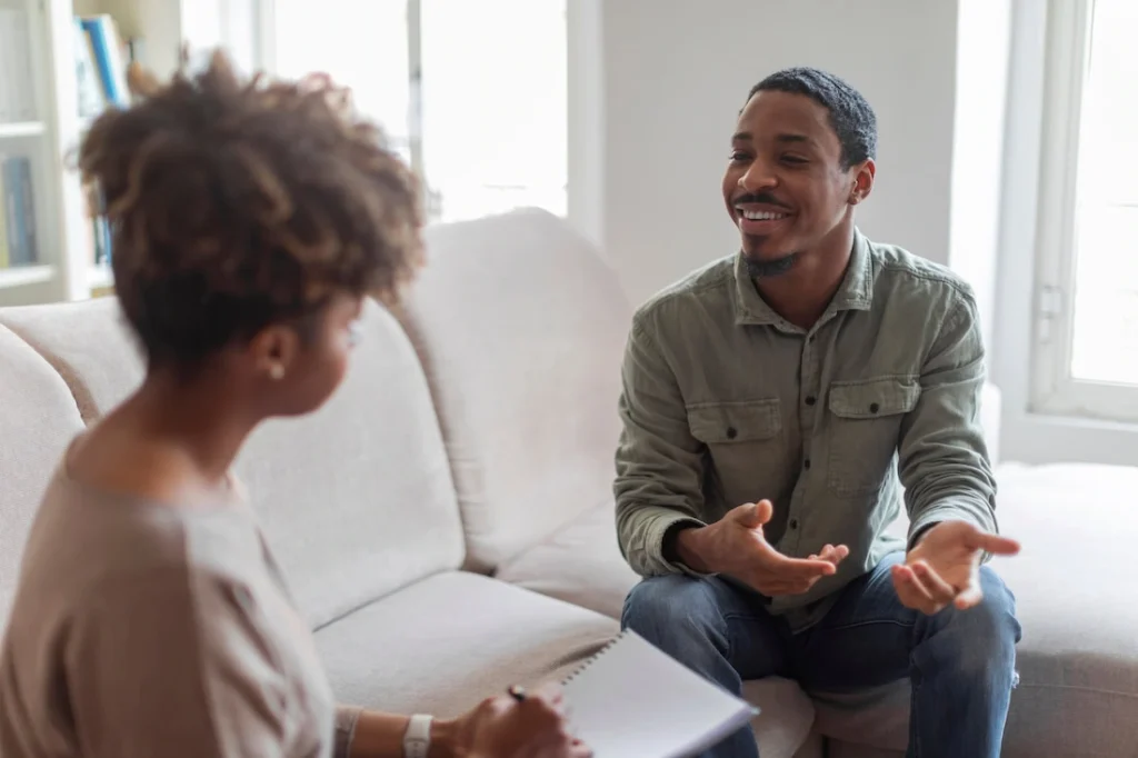 A person participates in therapy at a drug rehab center.